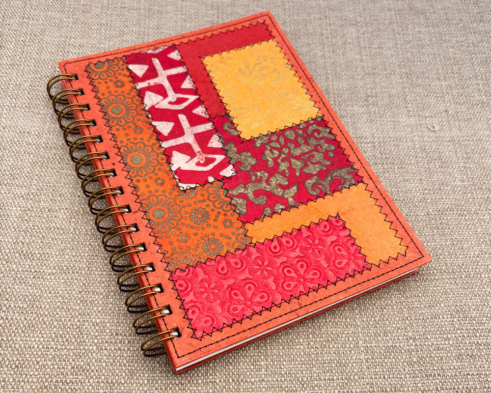 red and orange patchwork spiral notebook