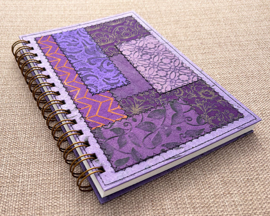 handmade spiral notebook with purple patchwork cover