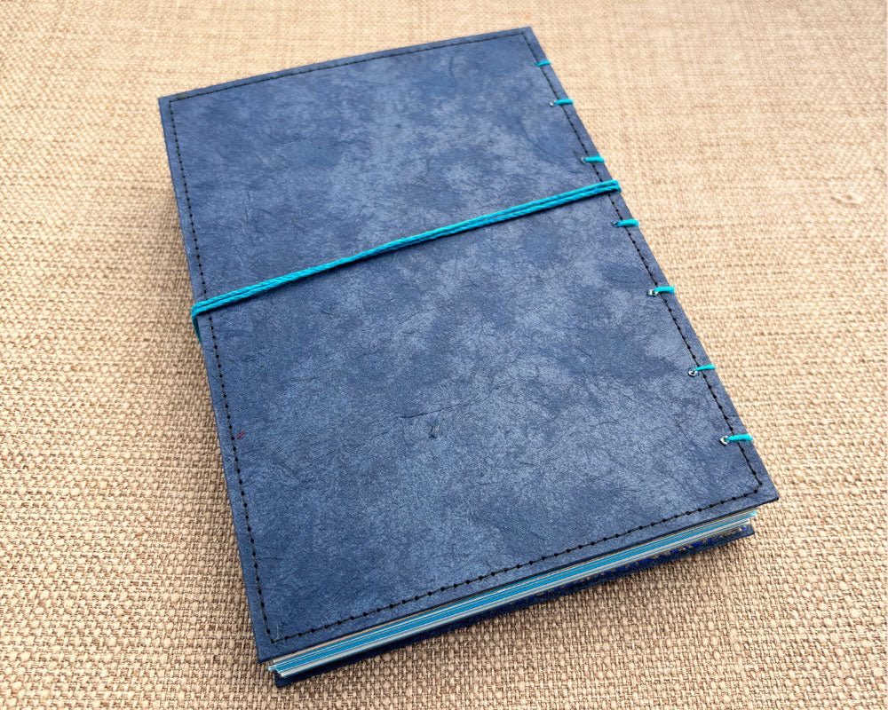 back cover of blue hand stitched journal