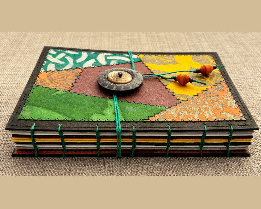 detail of hand-stitched spine on handmade journal