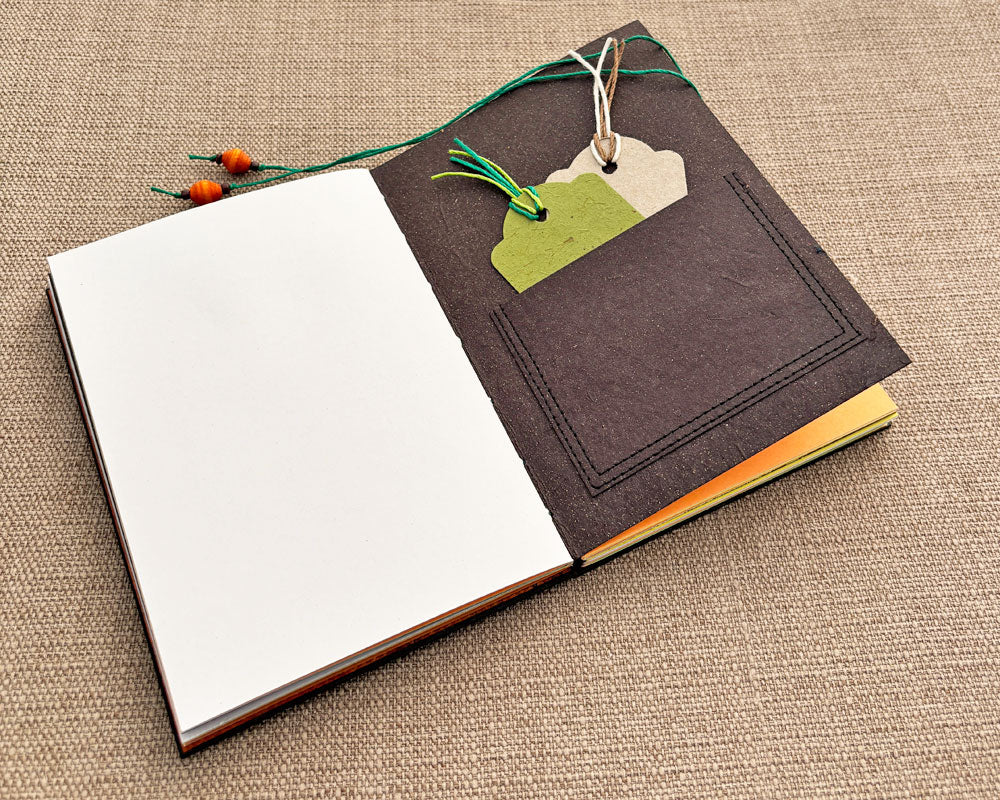 tags in pocket inside hand stitched journal