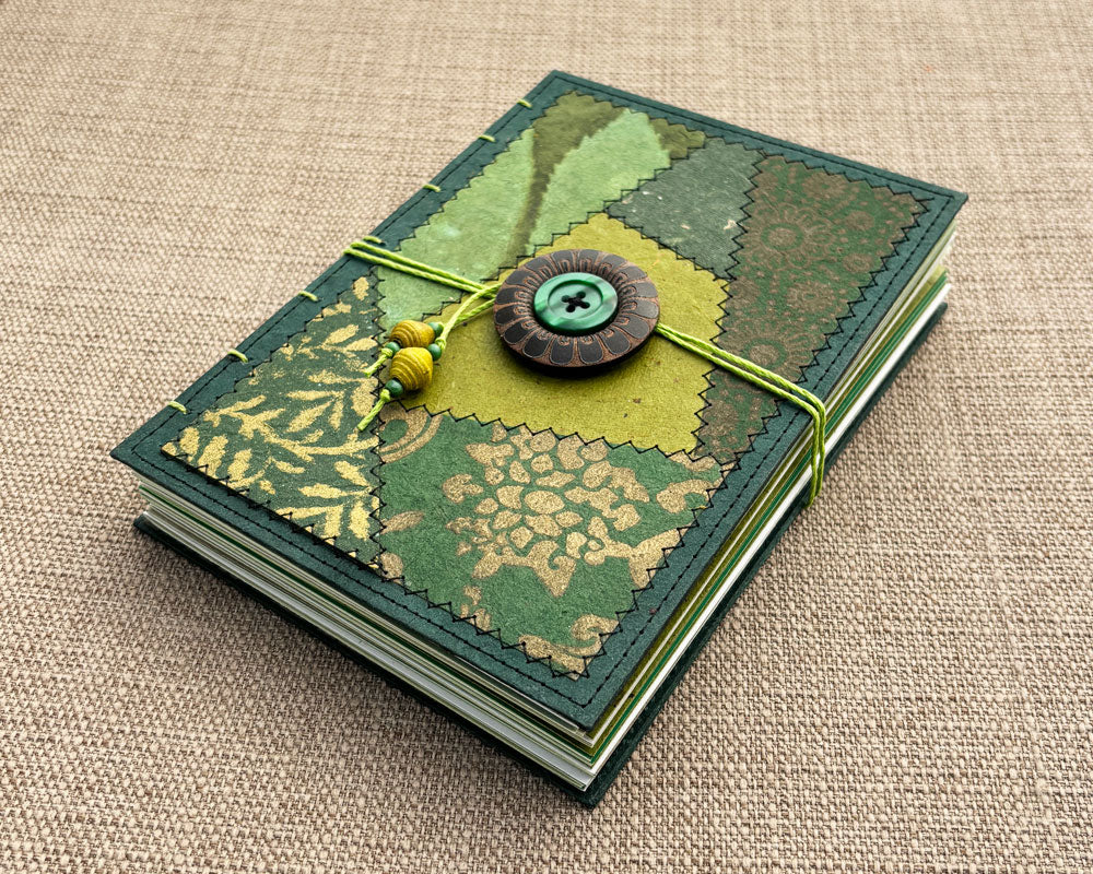 hand bound journal with green patchwork cover