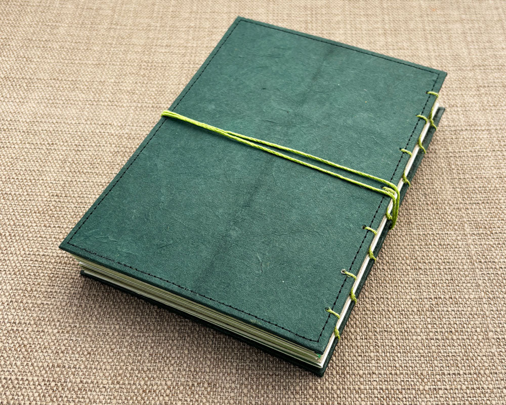 back cover of green hand stitched journal