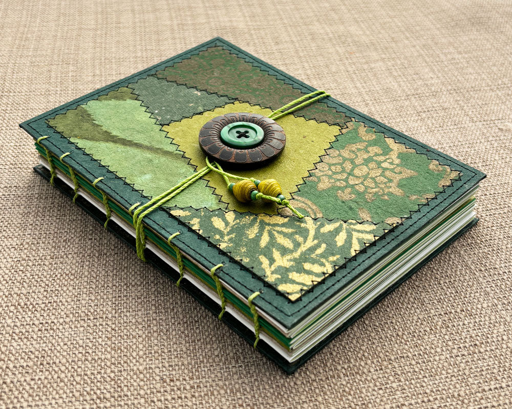 green hand stitched journal with patchwork cover design