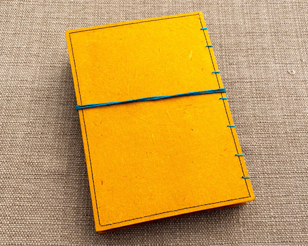 gold coloured back cover of hand bound journal