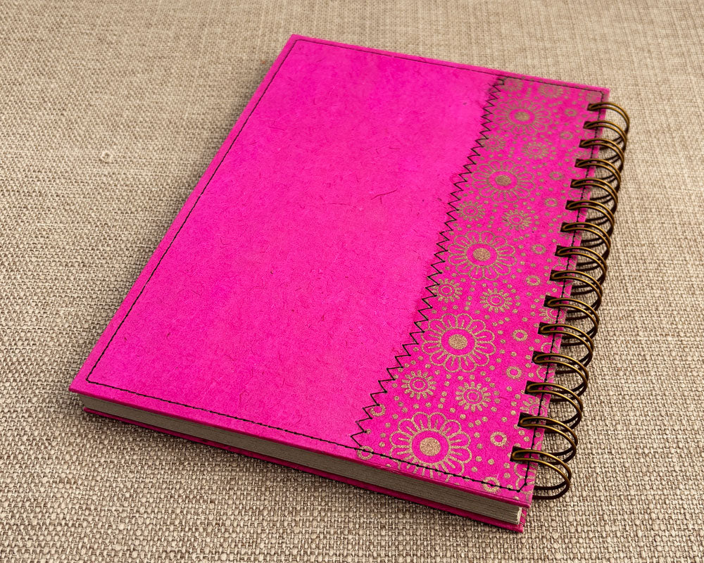 back cover of pink spiral notebook