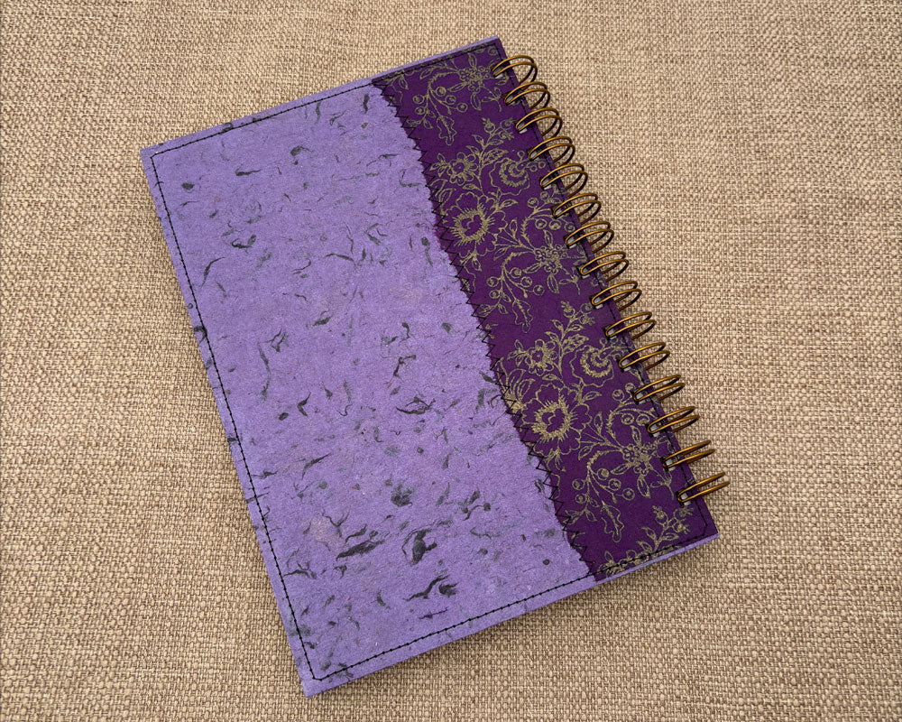 back cover of purple spiral notebook