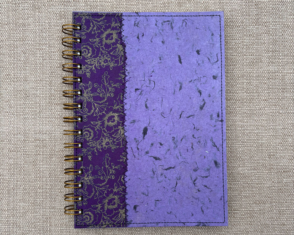 front cover of purple handmade spiral notebook