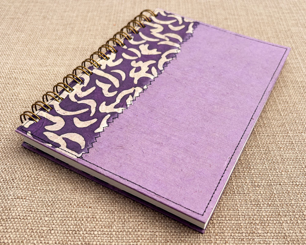 handmade spiral notebook with two-toned purple cover