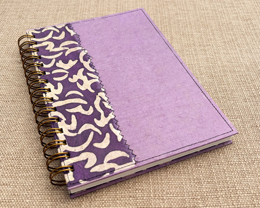 handmade spirala notebook with purple cover
