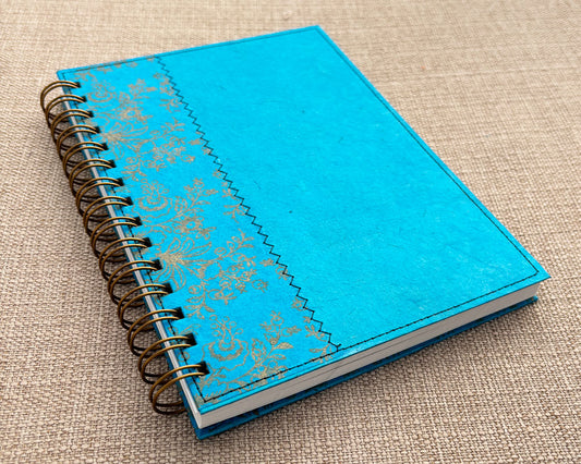 handmade spiral notebook with vibrant turquoise cover